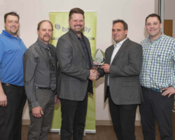 Credence Construction accepts the Peoples' Choice Award from Yorkton Chamber President Marty Sveinbjornson