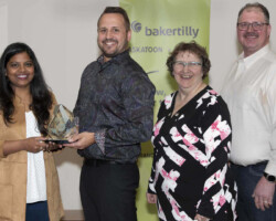Priya Timiri from Community Futures Ventures, presents the Marketing Award to RCM Outdoors