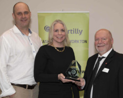 Triple A Directional Drilling accepts the Safety Award sponsored by WorkSafe Saskatchewan from Garry Hamblin