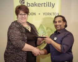 Relax, Eat, Drink – Grumpy’s Grill :  Marianne Tank of Grumpy’s Grill accepted the Relax, Eat, Drink Award sponsored by the Yorkton Chamber of Commerce and presented by Chamber President, Sunil Shah.