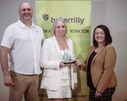 Award of Excellence – Triple A Directional Drilling: Brooke & Vanessa Andres of Triple A Directional Drilling accept the Award of Excellence presented by Kami De Pape of Suncrest College.